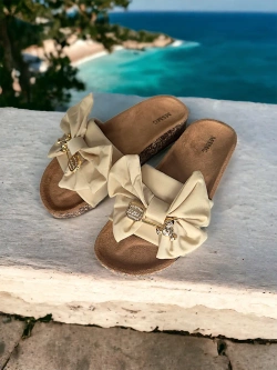 Damskie klapki beżowe z kokardą DZ125-63